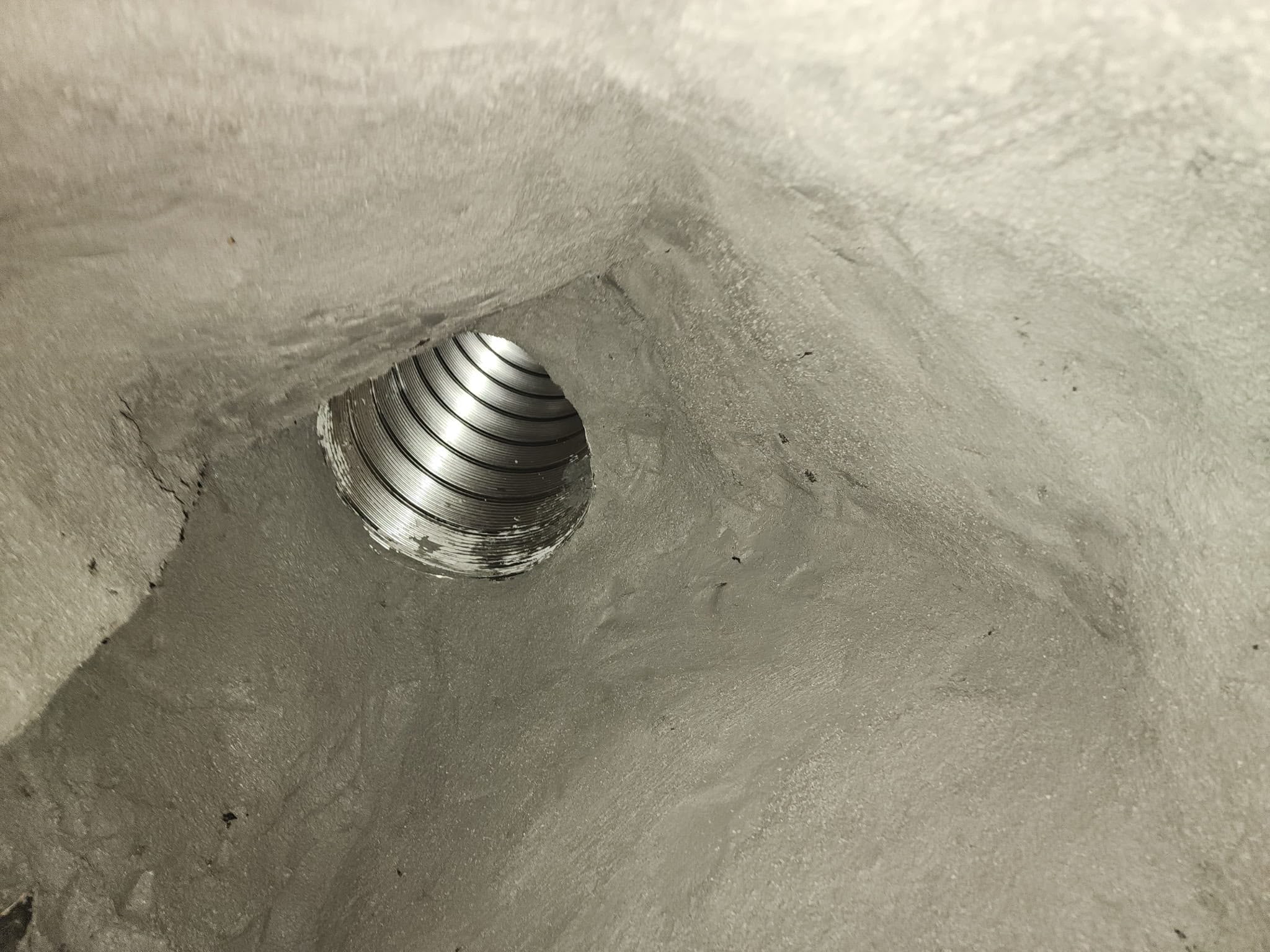 After: the Alexandria smoke chamber parged smooth with refractory mortar around the newly installed stainless steel liner