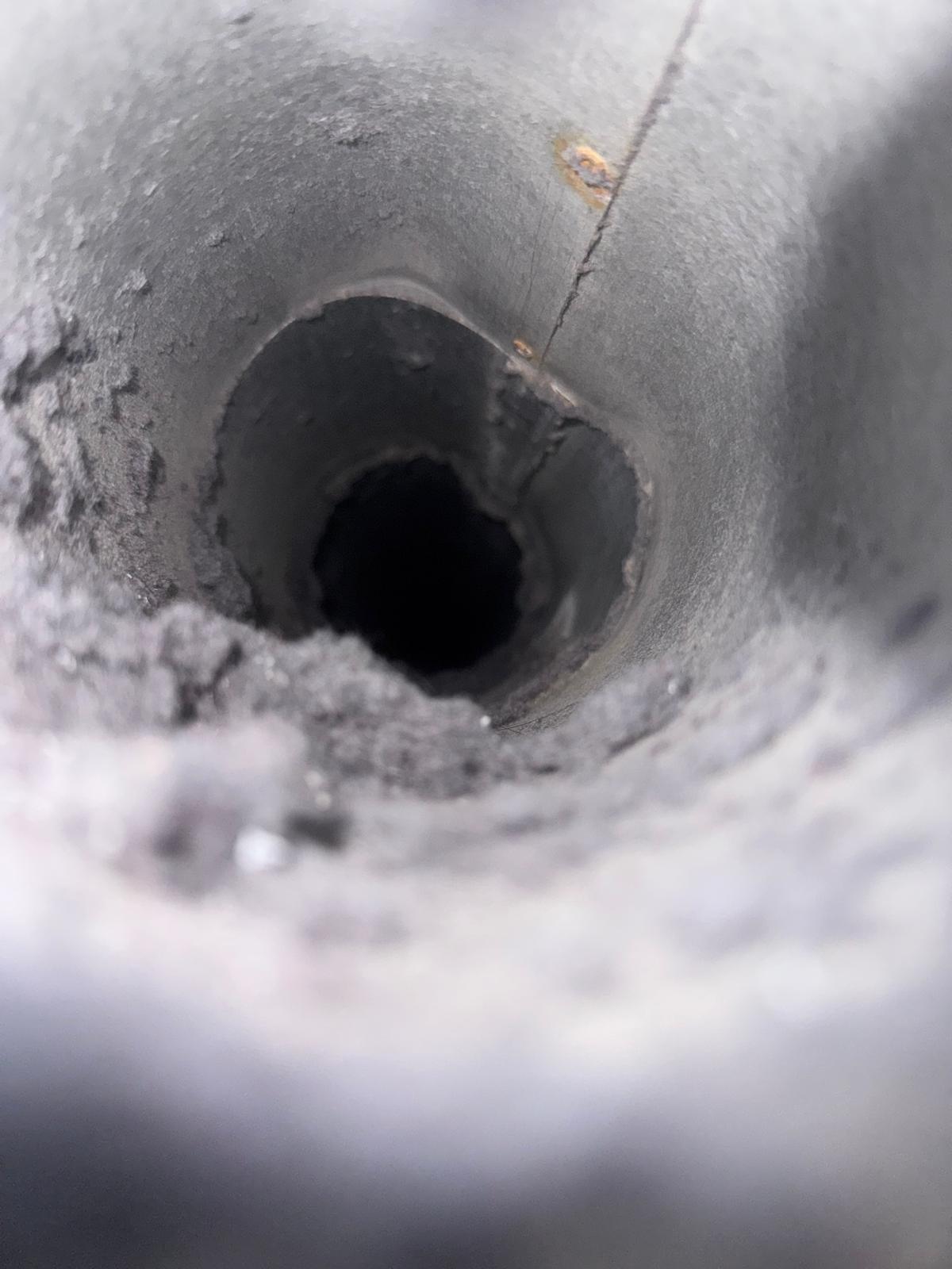Before: lint buildup inside a McLean home's dryer vent duct