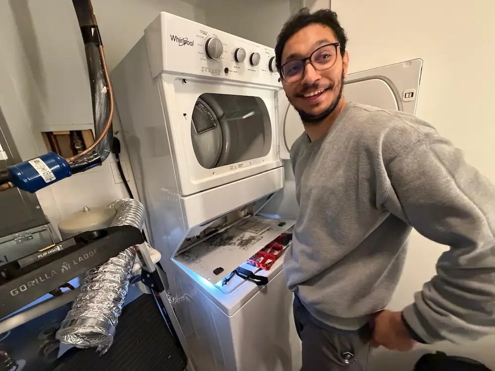 CleanFlow Pros lead technician on a dryer vent cleaning job in Northern Virginia